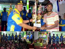 Kapolres Mamberamo Raya Menyerahkan Piala Pemenang Pertandingan Sepak Bola Bupati Cap Iii di Kasonaweja