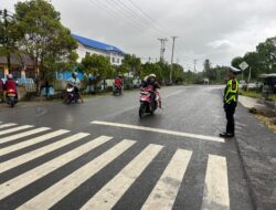 Sat Lantas Polres Sarmi Laksanakan Strong Point untuk Kelancaran Arus Lalu Lintas