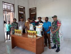 Polsek Pantai Barat Dampingi Penyaluran Bantuan Pangan di Distrik Pantai Barat