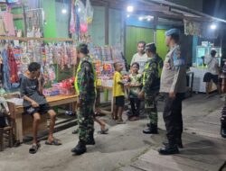 Personel Pos Pam Operasi Lilin Cartenz 2025 Laksanakan Patroli dan Imbauan Jelang Tahun Baru di Sarmi Kota