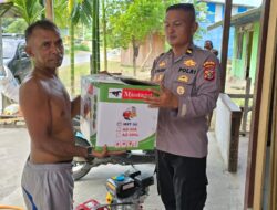 Sat Binmas Polres Sarmi Berikan Bantuan Usaha Mesin Cuci Motor Bagi Warga Kampung Neidam