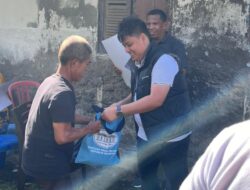 Peduli Warga Kurang Mampu, Anggota Koramil Lembeh Dampingi Penyaluran Bantuan Sembako