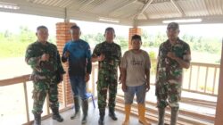 Tingkatkan Ketahanan Pangan, Personel Kodim 1310/Bitung Lakukan Perawatan Tanaman dan Ternak di Lokasi Kompi Produksi