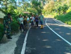 Kodim 1310/Bitung Bersama YTP 916/BS dan Masyarakat Gelar Kerja Bakti Gerakan Indonesia Asri, Bersihkan Jalan Penghubung Kasawari–Makawidey